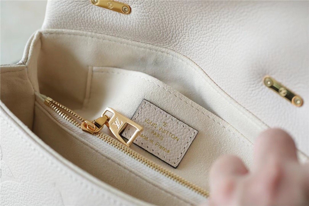 1:1 Replica Louis Vuitton LV Madeleine BB Monogram Empreinte Creme Beige Luxury Bag For Women M46008 - 9.4in/24cm - Image 9