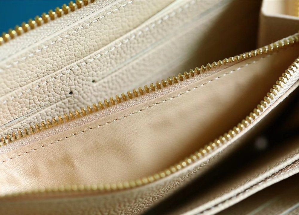 1:1 Replica Louis Vuitton Zippy Wallet Monogram Empreinte By The Pool Cream For Women, Women's Wallets 7.7in/19.5cm LV M80402