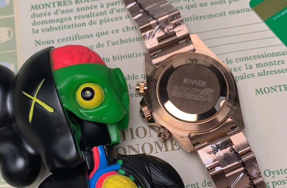 Rolex Daytona Cosmograph Rainbow Crystals Bezel Gold Toned Strap Black Dial 80251