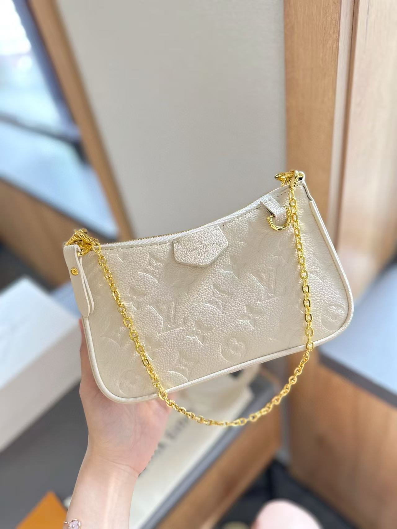 1:1 Replica Louis Vuitton LV Easy Pouch On Strap Monogram Empreinte Luxury Women Bag M81066