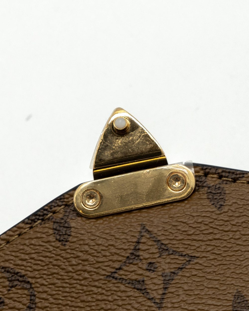 AAA Replica Louis Vuitton LV POCHETTE MÉTIS MONOGRAM REVERSE CANVAS GHW