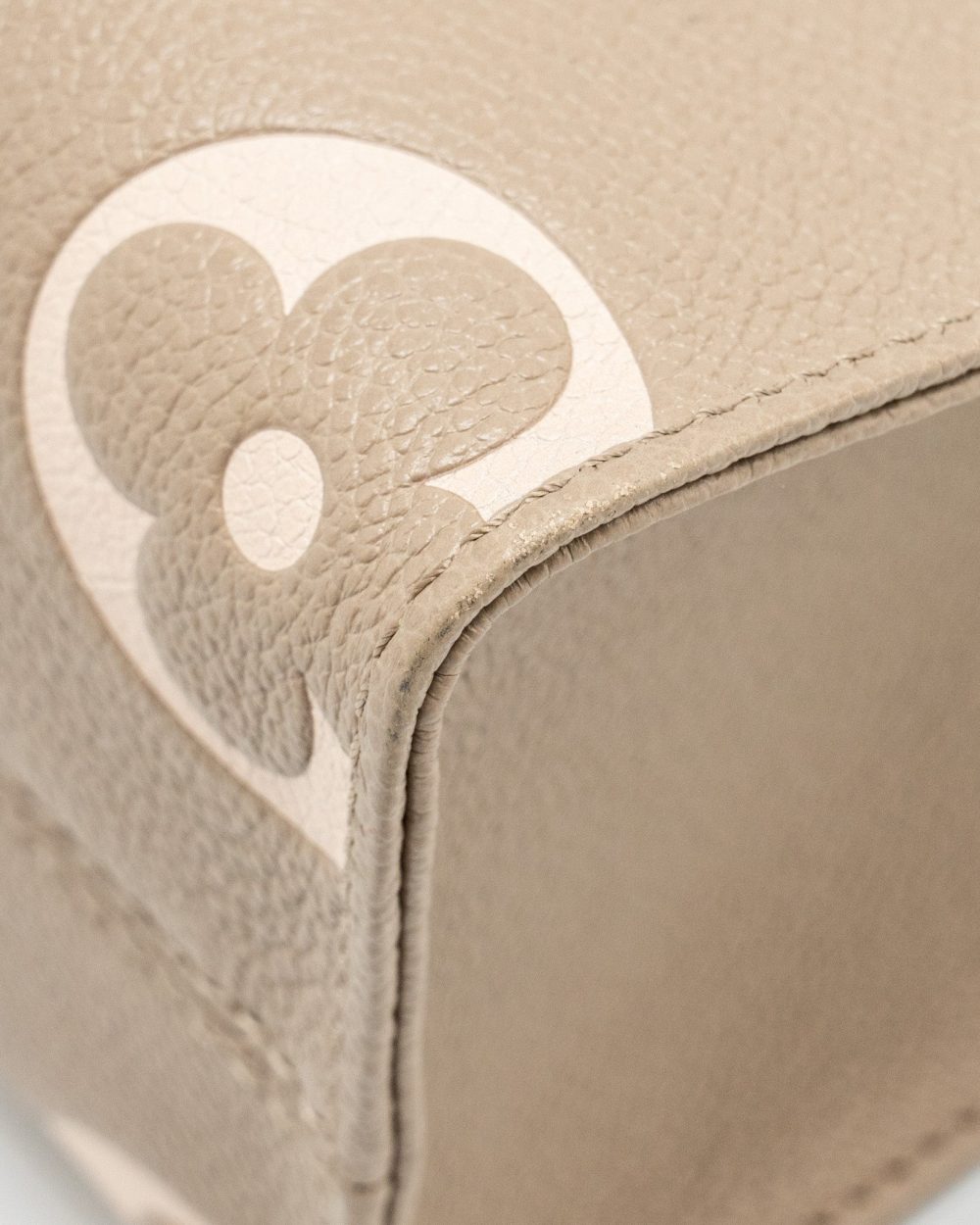 AAA Replica Louis Vuitton LV ONTHEGO PM BICOLOUR MONOGRAM EMPREINTE LEATHER TOURTERELLE/CREME GHW