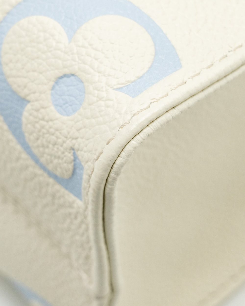 AAA Replica Louis Vuitton LV ONTHEGO PM BICOLOUR MONOGRAM EMPREINTE LATTE/CANDY BLUE GHW