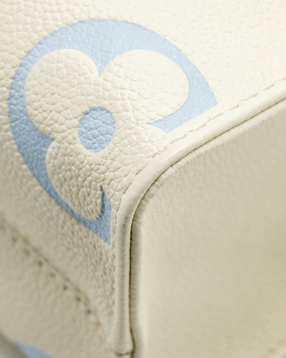 AAA Replica Louis Vuitton LV ONTHEGO PM BICOLOUR MONOGRAM EMPREINTE LATTE/CANDY BLUE GHW