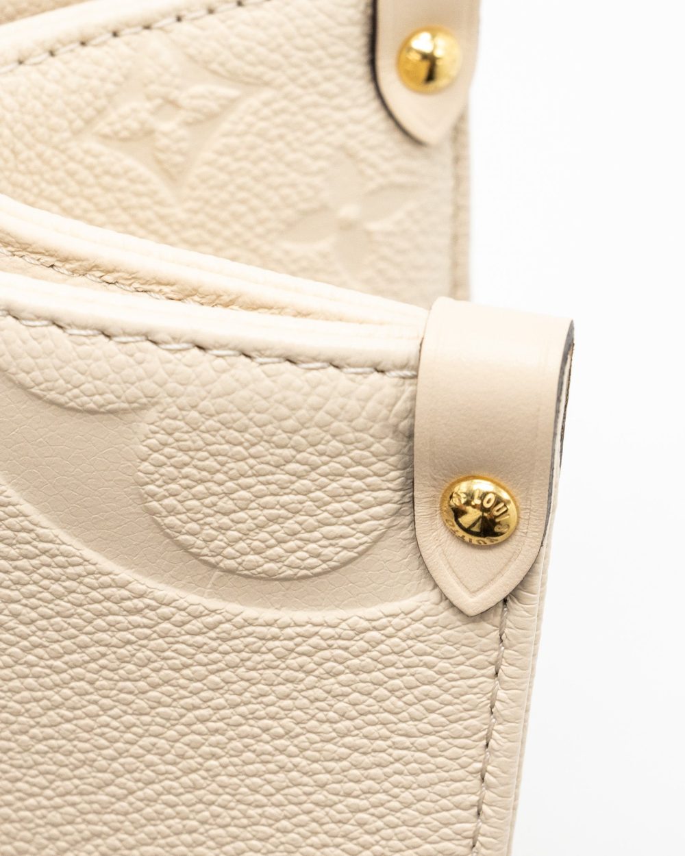 AAA Replica Louis Vuitton LV ONTHEGO MM EMPREINTE LEATHER WHITE GHW (NEW VERSION)