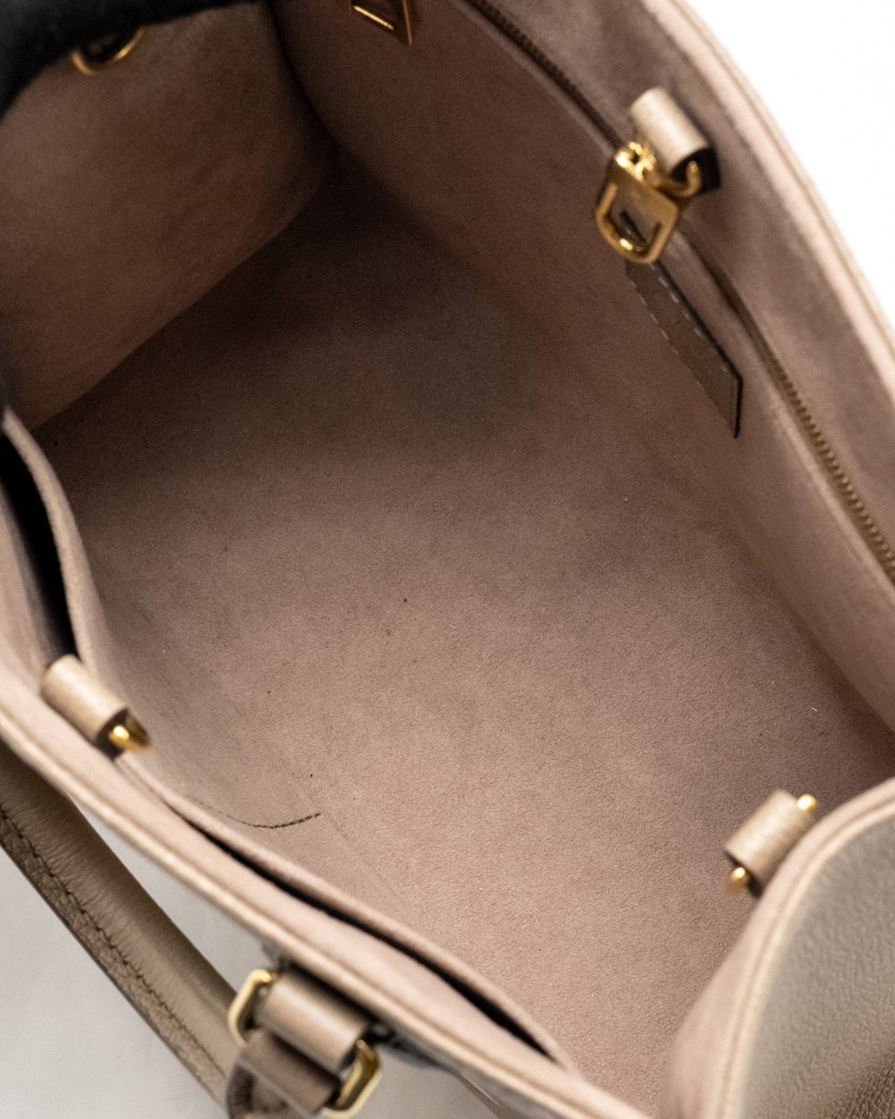 AAA Replica Louis Vuitton LV ONTHEGO PM BICOLOUR MONOGRAM EMPREINTE LEATHER TOURTERELLE/CREME GHW